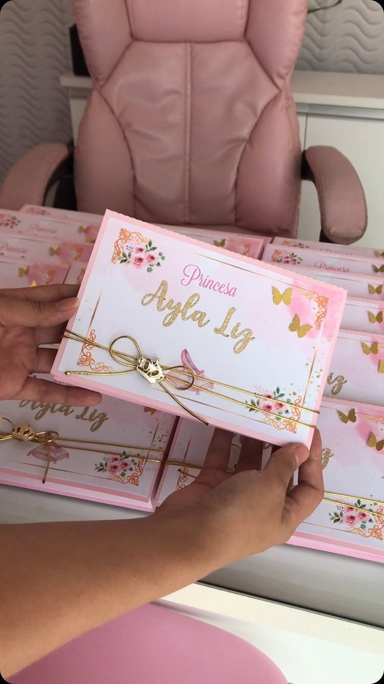 Pink and white floral invitation card for Princesa Ayla Liz tied with gold string