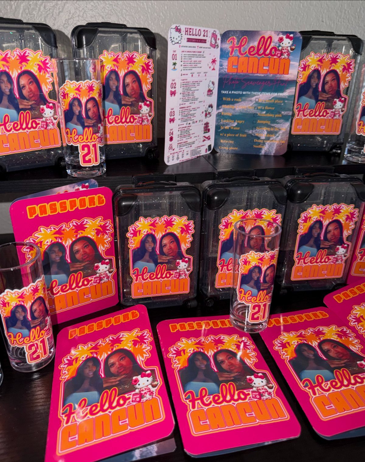 Personalized pink passport covers and glasses for a 21st birthday trip to Cancun.