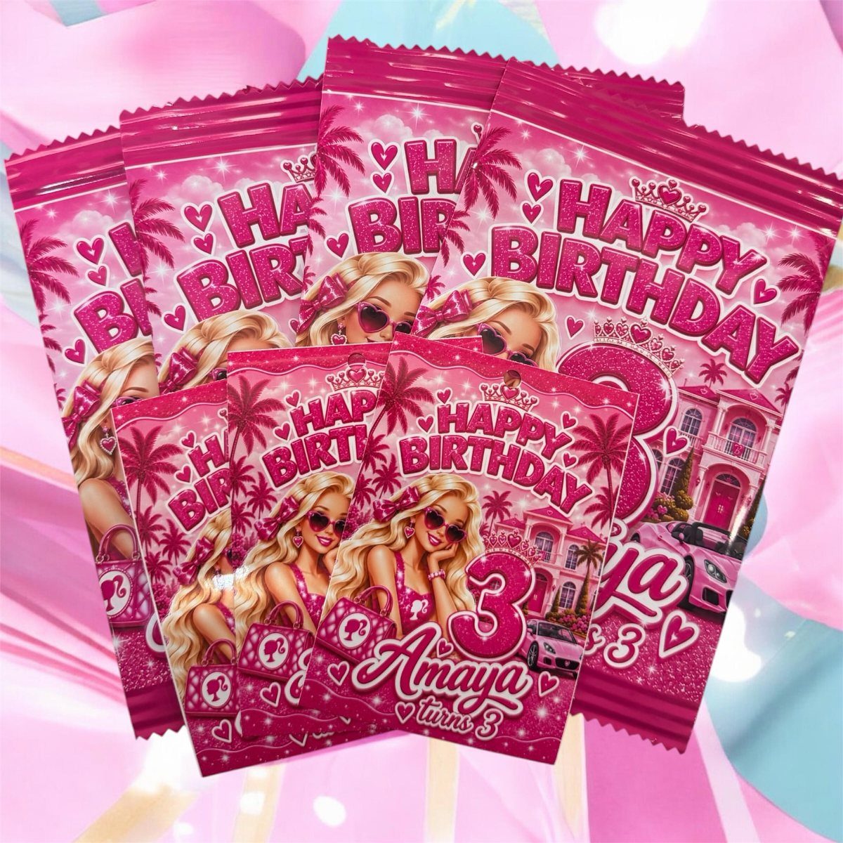 Pink personalized snack bags with a Barbie-style theme for Amaya's third birthday party.