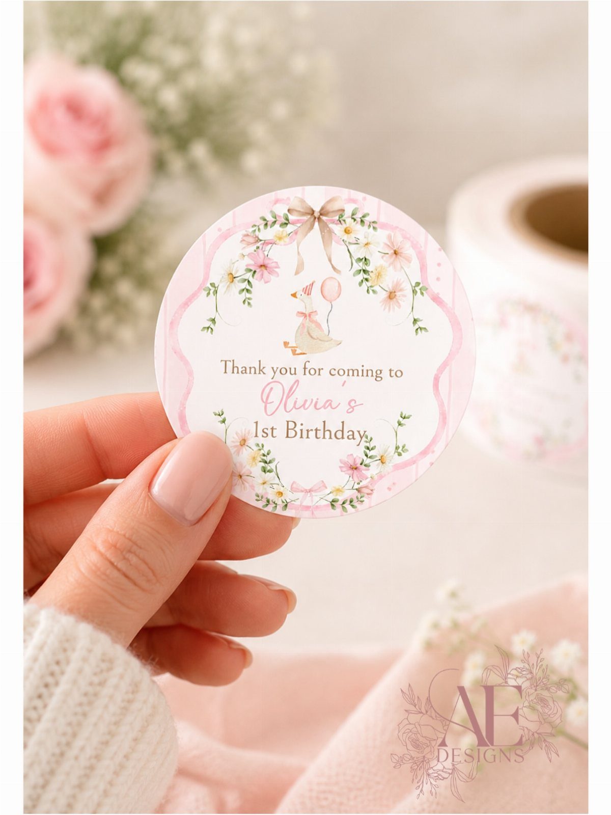 Circular birthday thank you sticker with pink flowers and a bunny illustration.