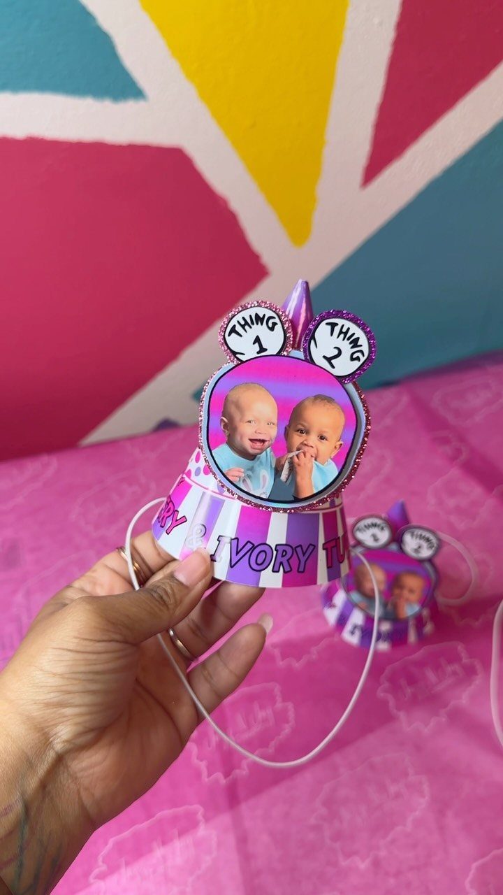 Party hat with baby photos and Thing 1 and Thing 2 toppers.